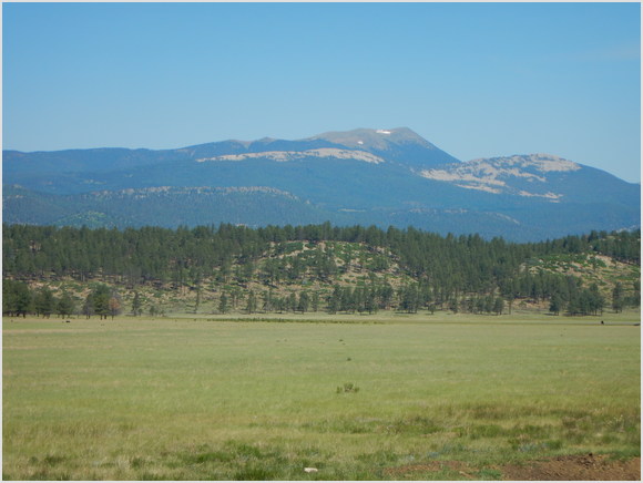 mountains past meadows