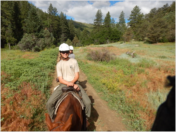Luke enjoying horse ride